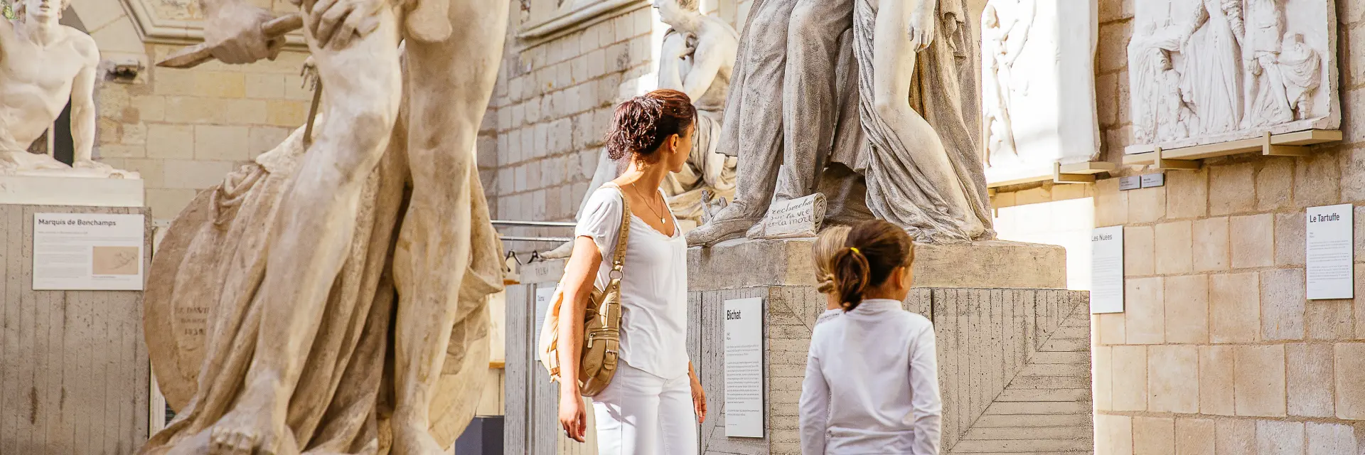 Mother and daughter visiting the David d'Angers Gallery