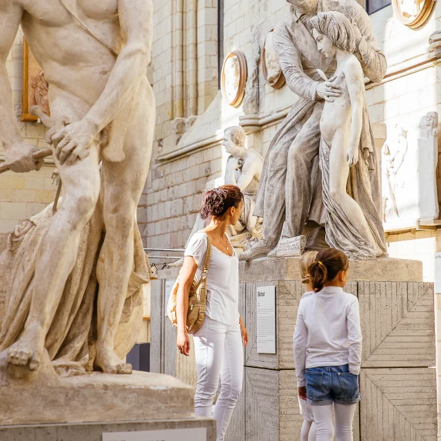 Mother and daughter visiting the David d'Angers Gallery