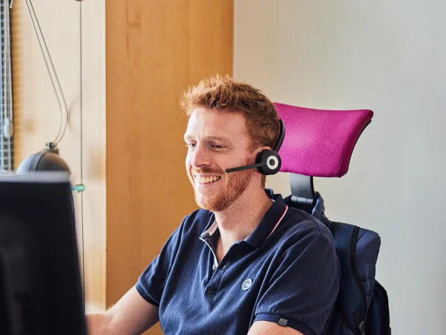 A man at the Tourist Office call centre